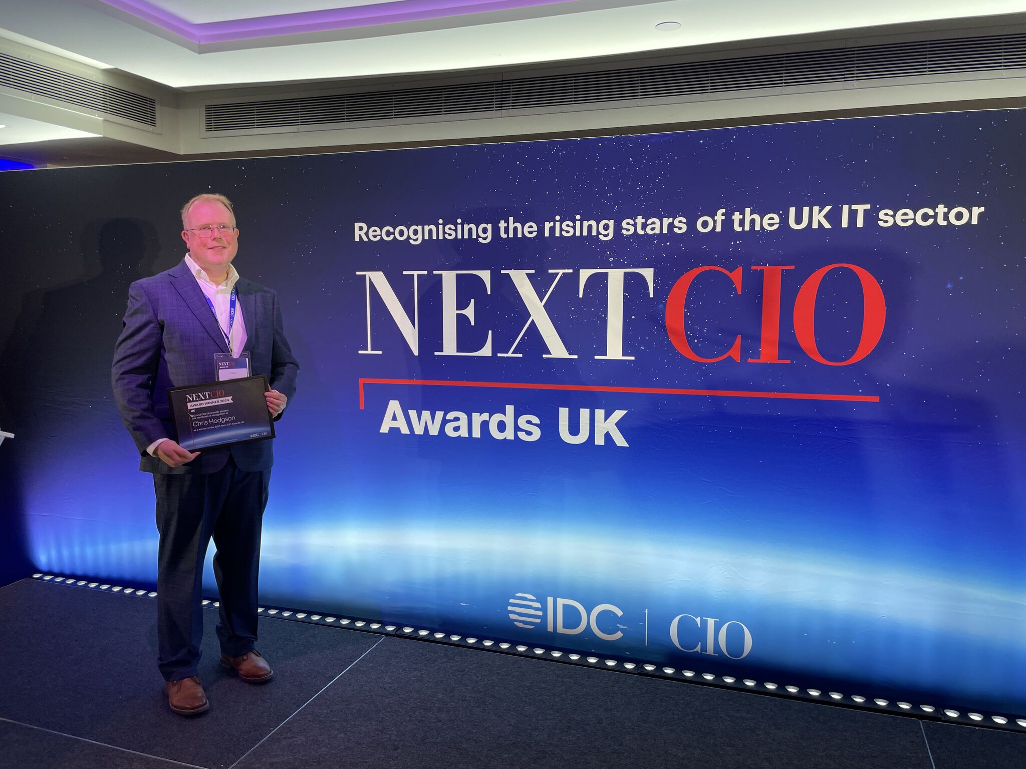 Chris Hodgson, Director of IT & Digital at Stoke on Trent College, receiving award.